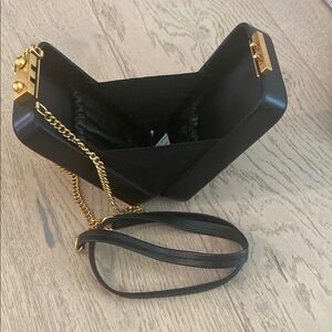 Elegant Black and Gold Women's Bag